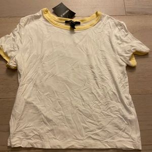 White and yellow tee